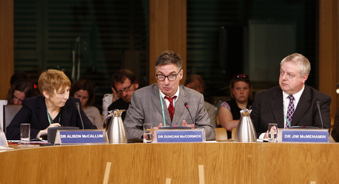 Dr Duncan McCormick gives evidence to the Health and Sport Committee as they take evidence on the recent Legionnaire's outbreak in Edinburgh.  Left, Dr Alison McCallum and, right, Dr Jim McMenamin  